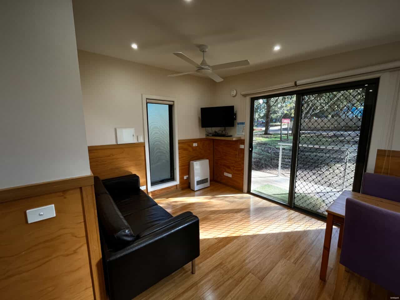 Lounge in a Bimbi Park ensuite cabin