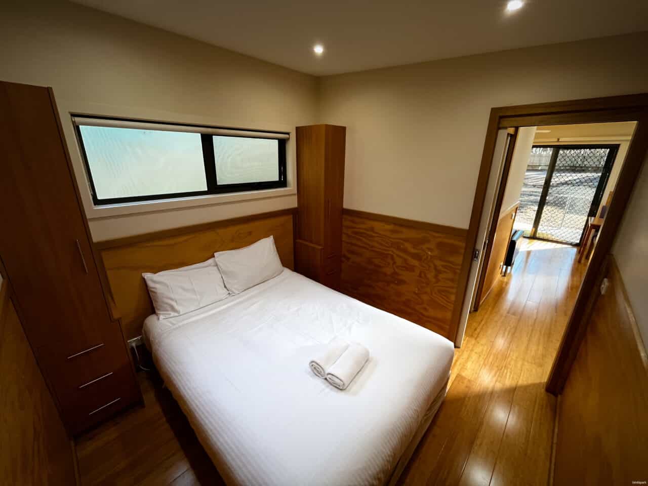 Queen bedroom in a Bimbi Park cabin