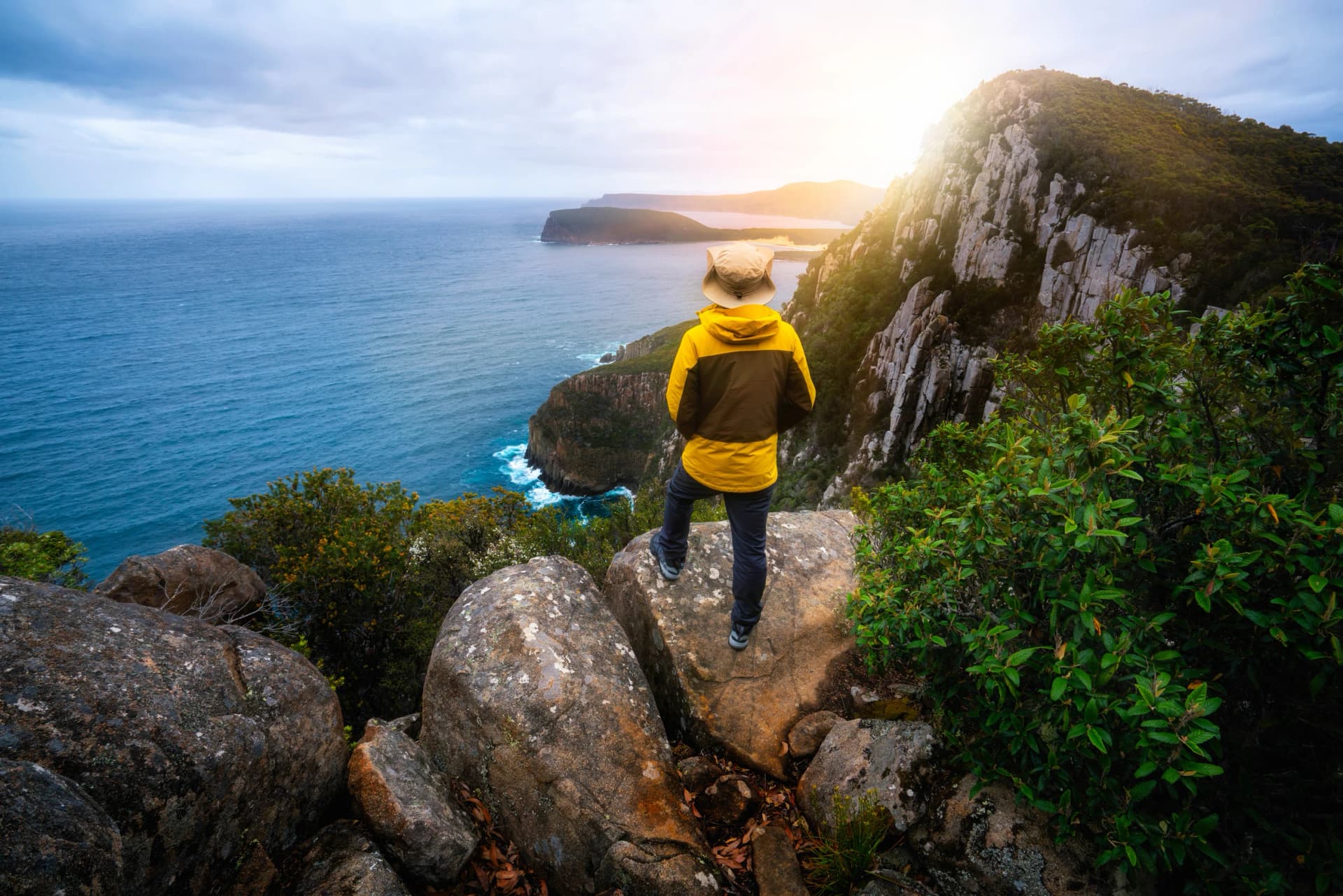 Hiker on the cliffs of Tasman National Park