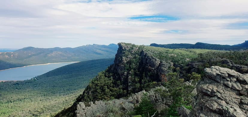 The Pinnacle cliffs overlooking Lake Bellfield in mountain landscape