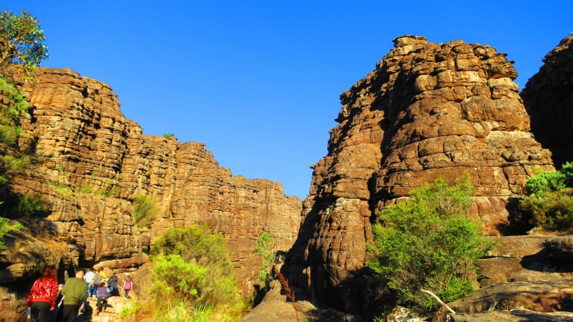 Walk between the sandstone walls of the Grand Canyon