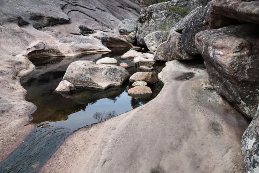 Rest by the rock pools at Venus Baths
