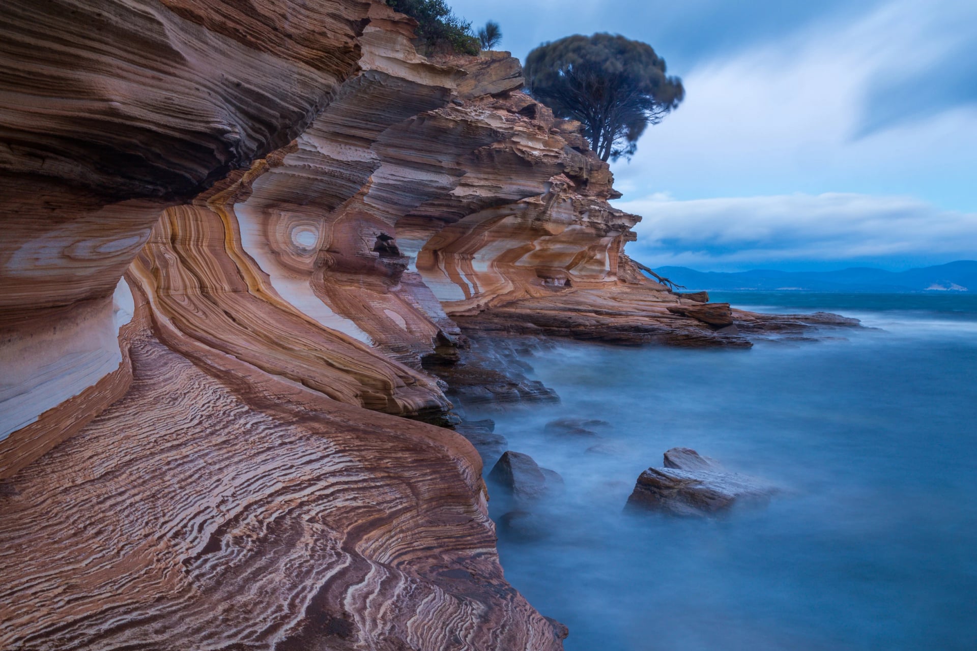 Time the Painted Cliffs walk for low tide on Maria Island