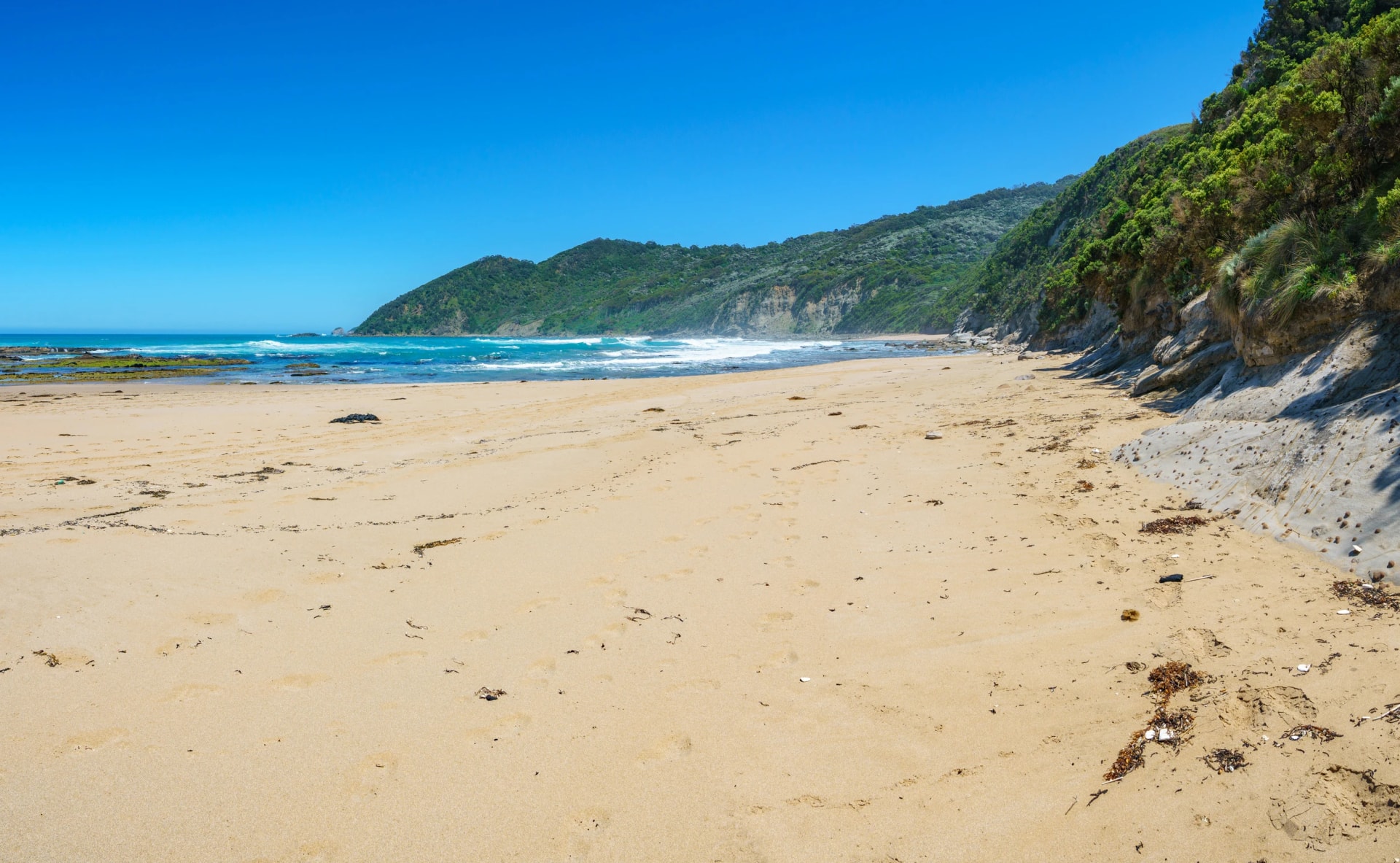Milanesia Beach below the cliffs
