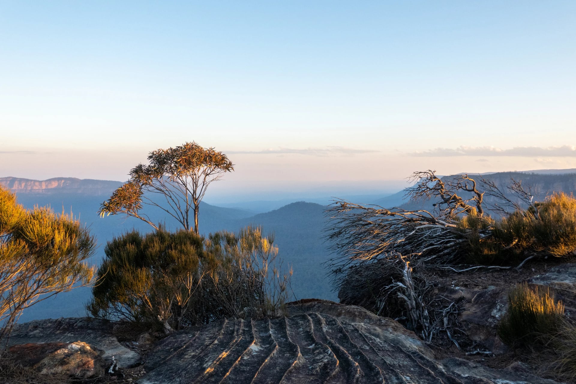 Watch the sunset from the rocks of Ruined Castle